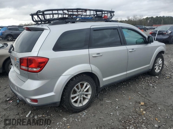 2013 Dodge Journey SXT with VIN 3C4PDDBG4DT571262, listed as a Copart auction lot 86795494 with 163,699 mi miles and Salvage title. Bid and sale history available at DreamBid. Image 3.