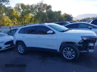 2019 Jeep Cherokee Latitude with VIN 1C4PJMCX0KD104155, listed as a IAAI auction lot 40647860 with 125,802 mi miles. Bid and sale history available at carsss.com. Image 13.