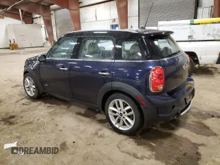 2013 MINI Countryman S ALL4 with VIN WMWZC5C5XDWM16477, listed as a Copart auction lot 51666385 with 112,383 mi miles and Salvage title. Bid and sale history available at DreamBid. Image 2.