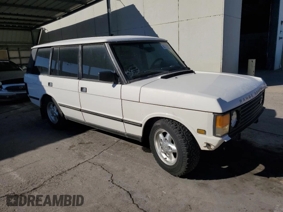 1995 Land Rover Range Rover with VIN SALHC1343SA656651, listed as a Copart auction lot 80172604 with 148,324 mi miles and Salvage title. Bid and sale history available at DreamBid. Image 4.