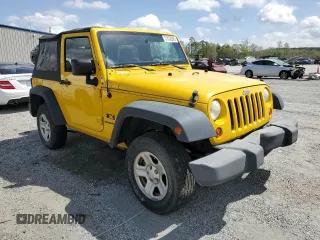 2009 Jeep Wrangler X with VIN 1J4FA241X9L765664, listed as a Copart auction lot 51802065 with 137,053 mi miles and Salvage Title. Bid and sale history available at DreamBid. Image 4.