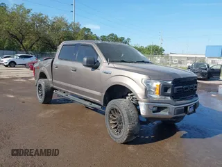 2018 Ford F-150 XL with VIN 1FTEW1EG1JFC31794, listed as a IAAI auction lot 41304111 with 129,058 mi miles and . Bid and sale history available at carsss.com. Image 1.