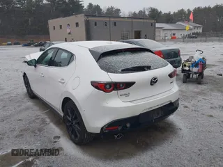 2022 Mazda Mazda3 Hatchback Premium with VIN JM1BPBML5N1501410, listed as a IAAI auction lot 41148682 with 8,541 mi miles. Bid and sale history available at carsss.com. Image 3.
