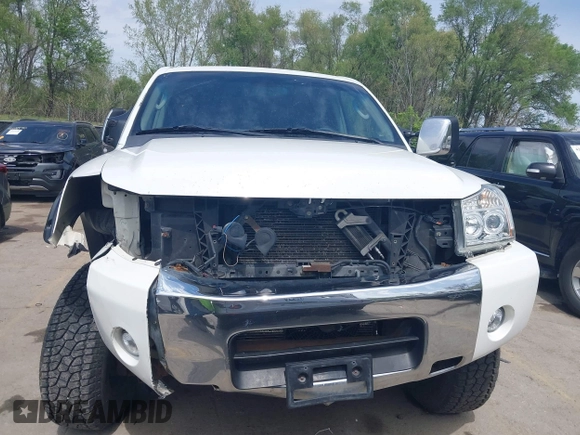 2005 Nissan Titan LE with VIN 1N6AA07BX5N525048, listed as a IAAI auction lot 41984150 with 242,321 mi miles. Bid and sale history available at carsss.com. Image 6.