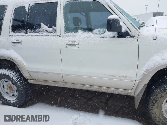 2001 Isuzu Trooper S with VIN JACDJ58X917J16544, listed as a IAAI auction lot 41258932 with 105,249 mi miles and . Bid and sale history available at DreamBid. Image 13.