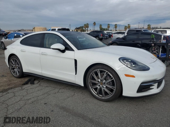 2020 Porsche Panamera с VIN WP0AA2A74LL103885, выставлен на аукционе Copart как лот 82222264 с пробегом 38 576 миль миль и Списание • Salvage title. История ставок и продаж доступна на DreamBid. Изображение 4.