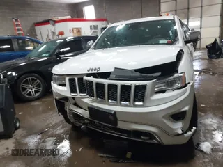 2015 Jeep Grand Cherokee Overland with VIN 1C4RJFCG2FC741015, listed as a IAAI auction lot 41607606 with 132,038 mi miles and . Bid and sale history available at DreamBid. Image 12.