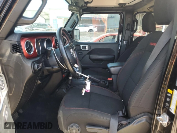 2020 Jeep Gladiator Rubicon z VIN 1C6JJTBG8LL154950, wystawiony jako Copart lot #53676205 z przebiegiem 22 999 mil mil oraz Szkoda całkowita • Salvage title. Historia ofert i sprzedaży dostępna na DreamBid. Obrazek 7.