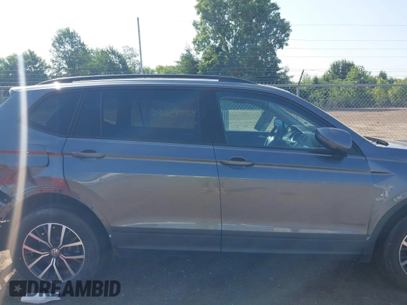 2021 Volkswagen Tiguan S with VIN 3VV0B7AX3MM038342, listed as a IAAI auction lot 42545665 with 66,809 mi miles and . Bid and sale history available at DreamBid. Image 14.