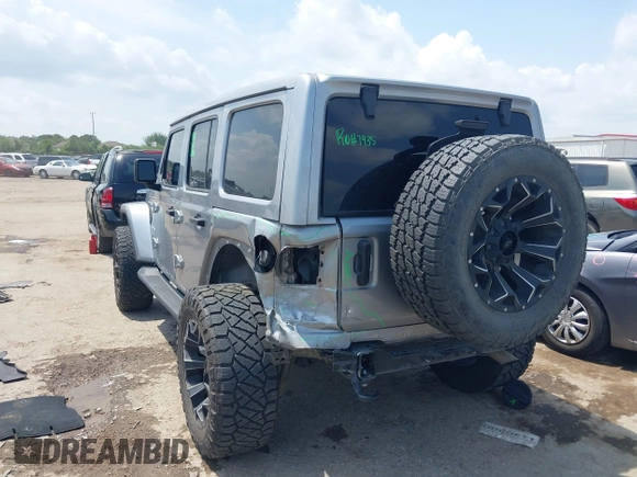 2021 Jeep Wrangler Unlimited High Altitude with VIN 1C4HJXEG3MW511185, listed as a IAAI auction lot 42125883 with 45,564 mi miles and . Bid and sale history available at DreamBid. Image 3.