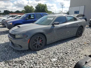 2019 Dodge Charger Scat Pack with VIN 2C3CDXGJ2KH633854, listed as a Copart auction lot 53296705 with 74,285 mi miles and Clean Title. Bid and sale history available at DreamBid. Image 1.