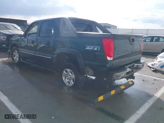 2003 Chevrolet Avalanche with VIN 3GNEK13T13G299307, listed as a IAAI auction lot 41663449 with 242,862 mi miles. Bid and sale history available at carsss.com. Image 3.
