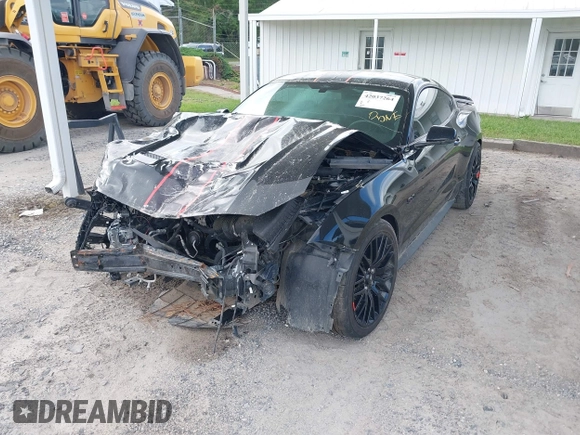 2018 Ford Mustang GT z VIN 1FA6P8CF0J5184418, wystawiony jako IAAI lot #42037264 z przebiegiem 99 679 mil mil oraz . Historia ofert i sprzedaży dostępna na DreamBid. Obrazek 18.