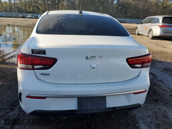 2022 Kia Rio LX with VIN 3KPA24AD3NE479603, listed as a Copart auction lot 49273645 with 67,286 mi miles and Salvage Title. Bid and sale history available at DreamBid. Image 6.