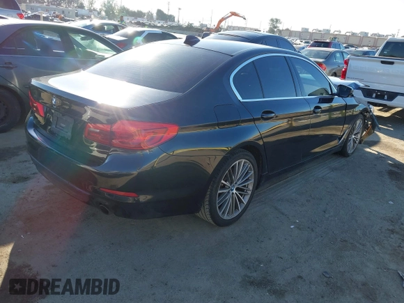 2019 BMW 5 Series 530e with VIN WBAJA9C57KB399541, listed as a IAAI auction lot 41656775 with 96,523 mi miles and . Bid and sale history available at DreamBid. Image 4.