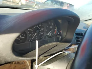 1999 BMW 3 Series 328i with VIN WBAAM5335XKG09109, listed as a Copart auction lot 87384704 with 0 mi miles and Salvage Title. Bid and sale history available at carsss.com. Image 9.