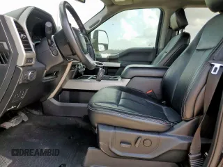 2021 Ford F-250 XL with VIN 1FT7W2BT6MEC47760, listed as a Copart auction lot 61908225 with 111,015 mi miles and Salvage title. Bid and sale history available at DreamBid. Image 7.