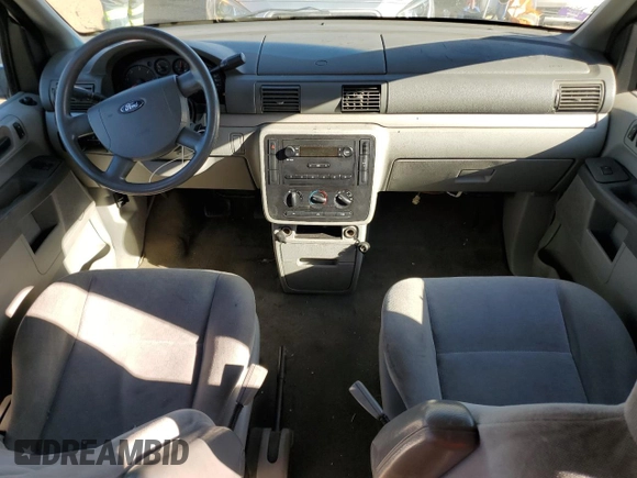 2007 Ford Freestar Cargo z VIN 2FTZA54677BA14812, wystawiony jako Copart lot #78543704 z przebiegiem 258 216 mil mil oraz Szkody całkowita. Historia ofert i sprzedaży dostępna na DreamBid. Obrazek 8.