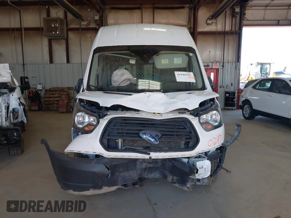 2019 Ford Transit Cargo with VIN 1FTBW3XG4KKA66859, listed as a IAAI auction lot 41940297 with 175,609 mi miles. Bid and sale history available at carsss.com. Image 12.