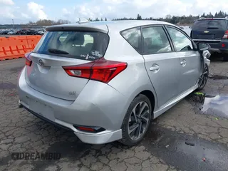 2016 Scion iM with VIN JTNKARJE2GJ508264, listed as a IAAI auction lot 41642646 with 136,213 mi miles. Bid and sale history available at carsss.com. Image 4.