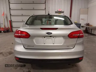 2017 Ford Focus SE z VIN 1FADP3F20HL245291, wystawiony jako IAAI lot #42194880 z przebiegiem 93 764 mil mil oraz . Historia ofert i sprzedaży dostępna na DreamBid. Obrazek 16.