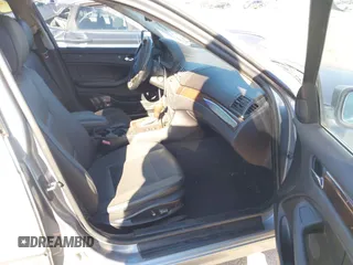 2004 BMW 3 Series 325i with VIN WBAET37414NJ84667, listed as a IAAI auction lot 41723669 with 160,384 mi miles. Bid and sale history available at carsss.com. Image 5.