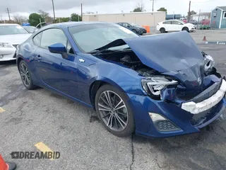 2015 Scion FR-S z VIN JF1ZNAA11F8709669, wystawiony jako IAAI lot #41794094 z przebiegiem 109 940 mil mil oraz . Historia ofert i sprzedaży dostępna na DreamBid. Obrazek 1.