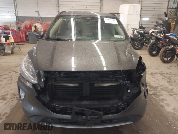 2020 Ford Escape Titanium with VIN 1FMCU9J95LUA39338, listed as a IAAI auction lot 42319122 with 34,631 mi miles and . Bid and sale history available at DreamBid. Image 13.