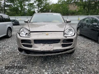 2006 Porsche Cayenne z VIN WP1AA29P26LA20396, wystawiony jako Copart lot #61154545 z przebiegiem 192 608 mil mil oraz Czysty tytuł • Clean title. Historia ofert i sprzedaży dostępna na DreamBid. Obrazek 5.