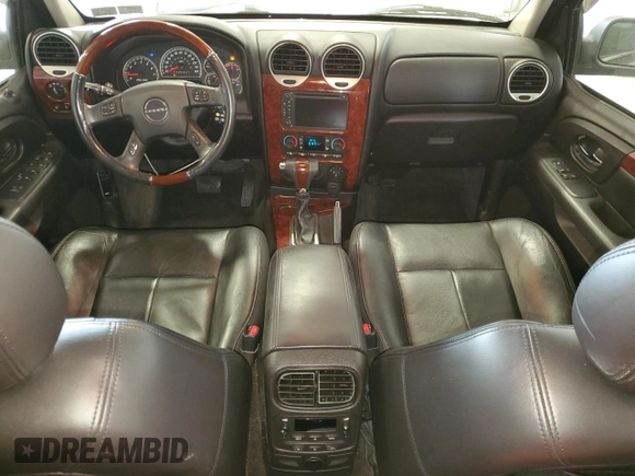 2008 GMC Envoy Denali with VIN 1GKET63M682243721, listed as a Copart auction lot 75963404 with 163,178 mi miles and Salvage Title. Bid and sale history available at DreamBid. Image 8.
