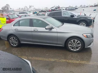 2015 Mercedes-Benz C-Class C 300 with VIN 55SWF4JB8FU057426, listed as a IAAI auction lot 41558621 with 106,655 mi miles. Bid and sale history available at carsss.com. Image 13.