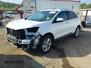 2020 Ford Edge SEL with VIN 2FMPK3J91LBA17010, listed as a IAAI auction lot 42144105 with 85,096 mi miles and . Bid and sale history available at DreamBid. Image 2.