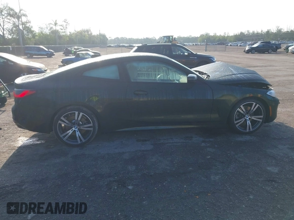 2021 BMW 4 Series 430i with VIN WBA53AP07MCG68388, listed as a IAAI auction lot 42198914 with 14,024 mi miles and . Bid and sale history available at DreamBid. Image 13.