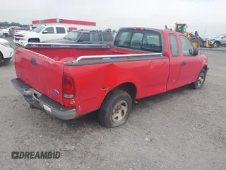 1997 Ford F-150 with VIN 1FTDX1724VKB63174, listed as a IAAI auction lot 42494621 with 205,978 mi miles and . Bid and sale history available at DreamBid. Image 4.