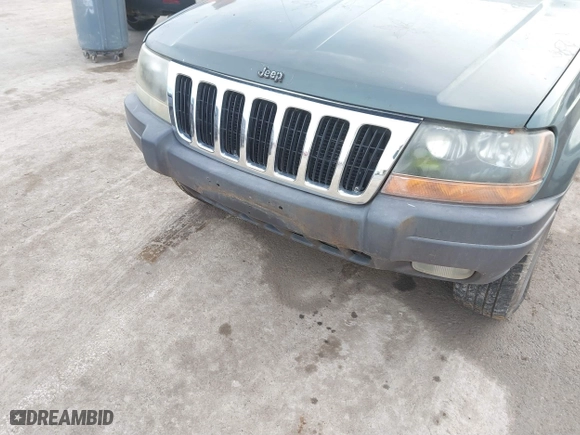 2003 Jeep Grand Cherokee Laredo with VIN 1J4GW48S93C583644, listed as a IAAI auction lot 41656314 with 256,653 mi miles. Bid and sale history available at carsss.com. Image 6.