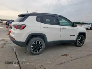 2020 Jeep Compass Trailhawk with VIN 3C4NJDDB3LT189398, listed as a Copart auction lot 59376995 with 75,674 mi miles and Salvage title. Bid and sale history available at DreamBid. Image 3.