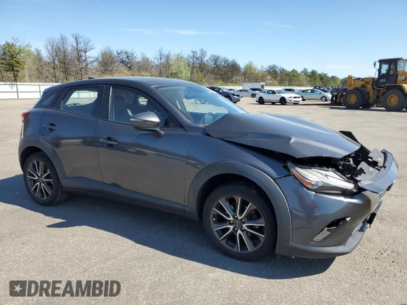 2017 Mazda CX-3 Touring z VIN JM1DKFC72H0167351, wystawiony jako Copart lot #56230945 z przebiegiem 78 894 mil mil oraz Szkody całkowita. Historia ofert i sprzedaży dostępna na DreamBid. Obrazek 4.