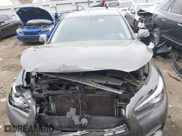 2014 Infiniti Q50 Premium z VIN JN1BV7AP8EM674625, wystawiony jako IAAI lot #41922173 z przebiegiem Nie podano mil oraz . Historia ofert i sprzedaży dostępna na DreamBid. Obrazek 12.