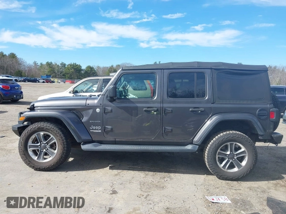 2018 Jeep Wrangler Unlimited Sahara with VIN 1C4HJXEG0JW246110, listed as a IAAI auction lot 41826662 with 65,236 mi miles. Bid and sale history available at carsss.com. Image 14.