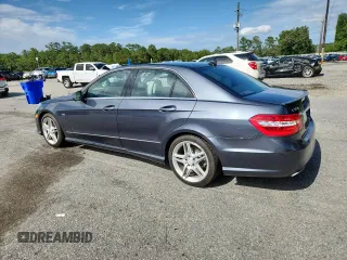 2012 Mercedes-Benz E 350 Luxury with VIN WDDHF5KB1CA520161, listed as a Copart auction lot 60303445 with 185,534 mi miles and Salvage title. Bid and sale history available at DreamBid. Image 2.