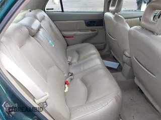 1998 Buick Regal GS with VIN 2G4WF5211W1484975, listed as a IAAI auction lot 41804514 with 168,850 mi miles. Bid and sale history available at carsss.com. Image 8.