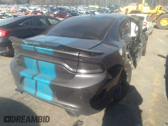 2023 Dodge Charger R/T with VIN 2C3CDXCT7PH576212, listed as a IAAI auction lot 41285793 with 37,471 mi miles and . Bid and sale history available at DreamBid. Image 4.