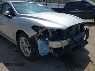 2018 Ford Fusion SE z VIN 3FA6P0H77JR226390, wystawiony jako IAAI lot #42120981 z przebiegiem 114 057 mil mil oraz . Historia ofert i sprzedaży dostępna na DreamBid. Obrazek 19.