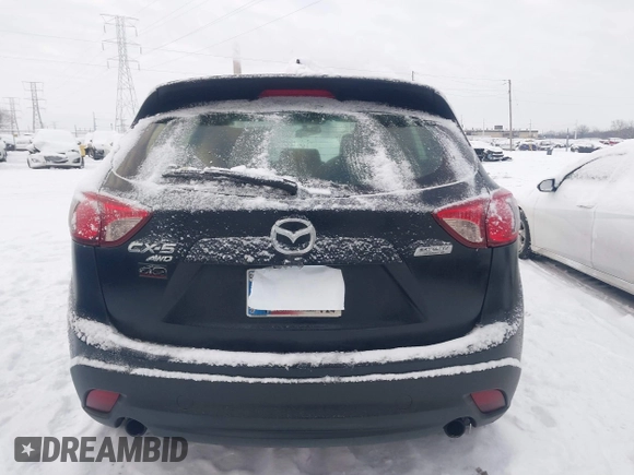 2016 Mazda CX-5 Sport z VIN JM3KE4BY0G0919017, wystawiony jako IAAI lot #41316161 z przebiegiem 209 259 mil mil oraz . Historia ofert i sprzedaży dostępna na DreamBid. Obrazek 16.