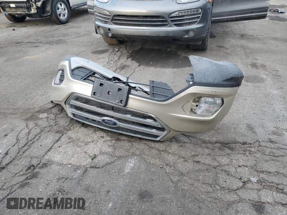 2018 Ford Escape SE z VIN 1FMCU9GD7JUA34635, wystawiony jako Copart lot #48379395 z przebiegiem 123 832 mil mil oraz Szkoda całkowita • Salvage title. Historia ofert i sprzedaży dostępna na DreamBid. Obrazek 13.