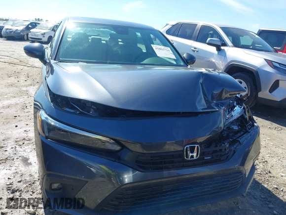 2023 Honda Civic Sedan Touring with VIN 2HGFE1F92PH318894, listed as a IAAI auction lot 41665714 with 15,746 mi miles. Bid and sale history available at carsss.com. Image 12.