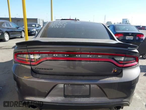 2019 Dodge Charger Scat Pack with VIN 2C3CDXGJ2KH564051, listed as a IAAI auction lot 41255283 with 64,687 mi miles and . Bid and sale history available at DreamBid. Image 16.