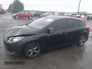 2014 Ford Focus ST with VIN 1FADP3L94EL180667, listed as a IAAI auction lot 41718746 with 141,574 mi miles and . Bid and sale history available at carsss.com. Image 14.