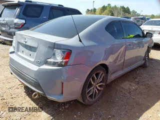 2014 Scion tC with VIN JTKJF5C78E3075164, listed as a IAAI auction lot 41922609 with 142,064 mi miles. Bid and sale history available at carsss.com. Image 4.