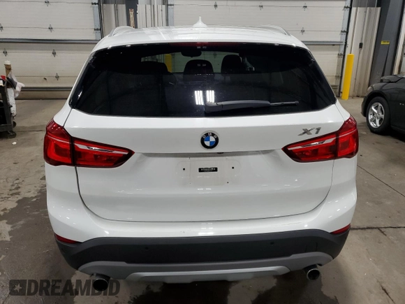 2017 BMW X1 xDrive28i with VIN WBXHT3Z38H4A53824, listed as a Copart auction lot 52500215 with 106,782 mi miles and Salvage title. Bid and sale history available at DreamBid. Image 6.